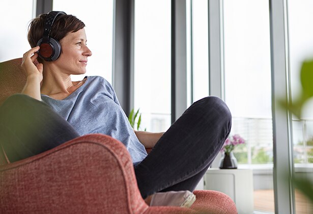 Woman listening to headphones